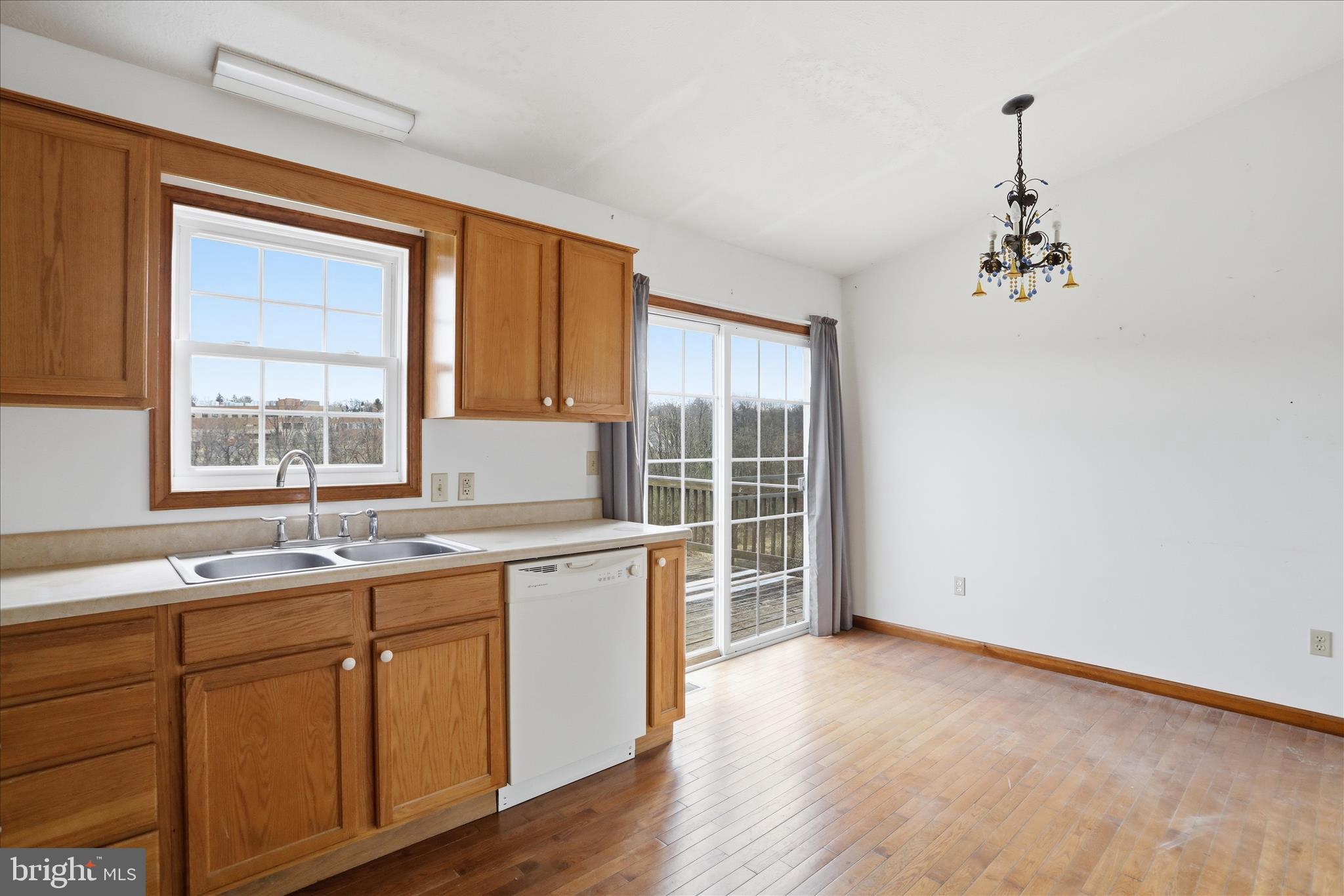 316 East Ridge Loop Road Romney, WV 26757 - Photo 14 of 33 a kitchen with a sink and windows