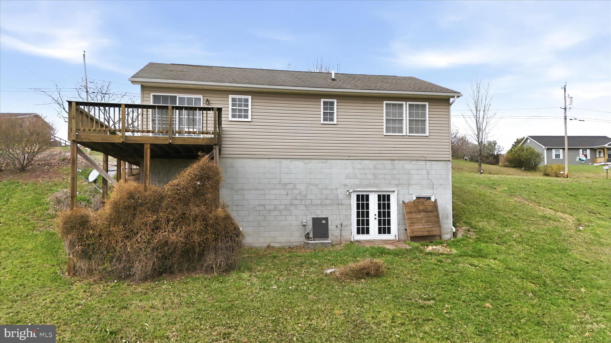 316 East Ridge Loop Road Romney, WV 26757 - Photo 32 of 33 a front view of a house with garden