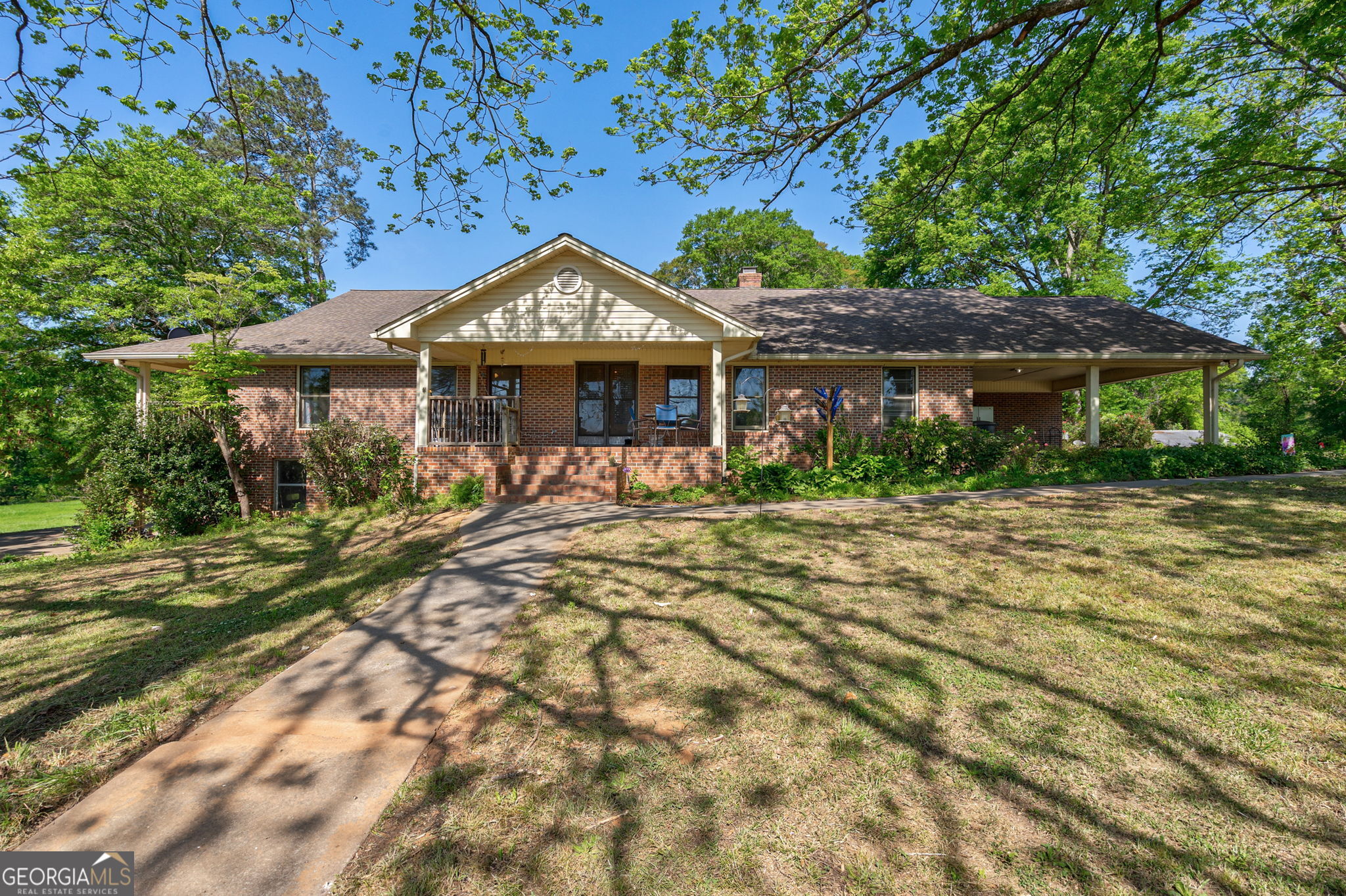 1281 Apalachee River Road Madison, GA 30650 - Photo 54 of 98 a front view of a house with a yard