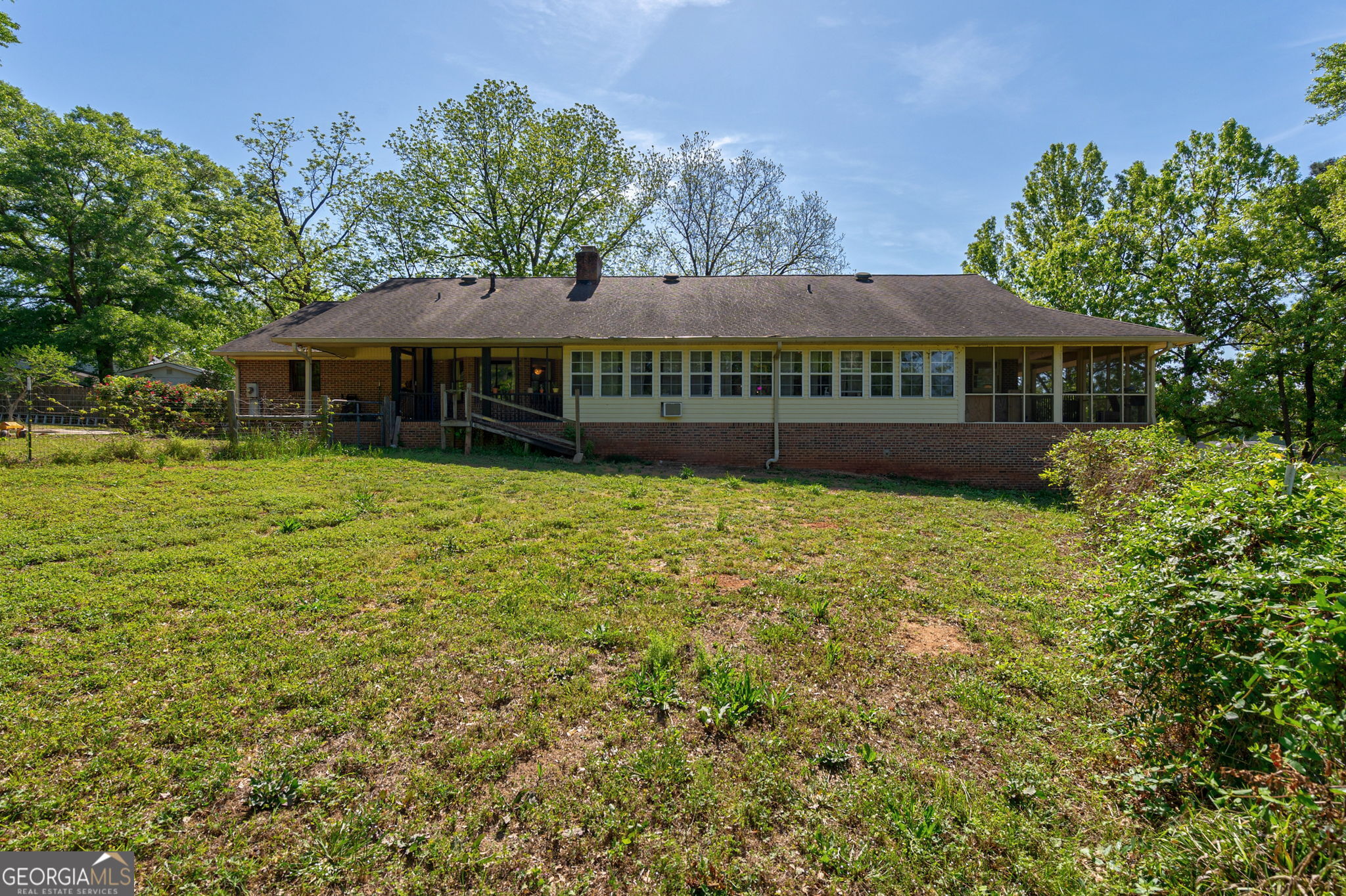1281 Apalachee River Road Madison, GA 30650 - Photo 62 of 98 a view of a house with a yard
