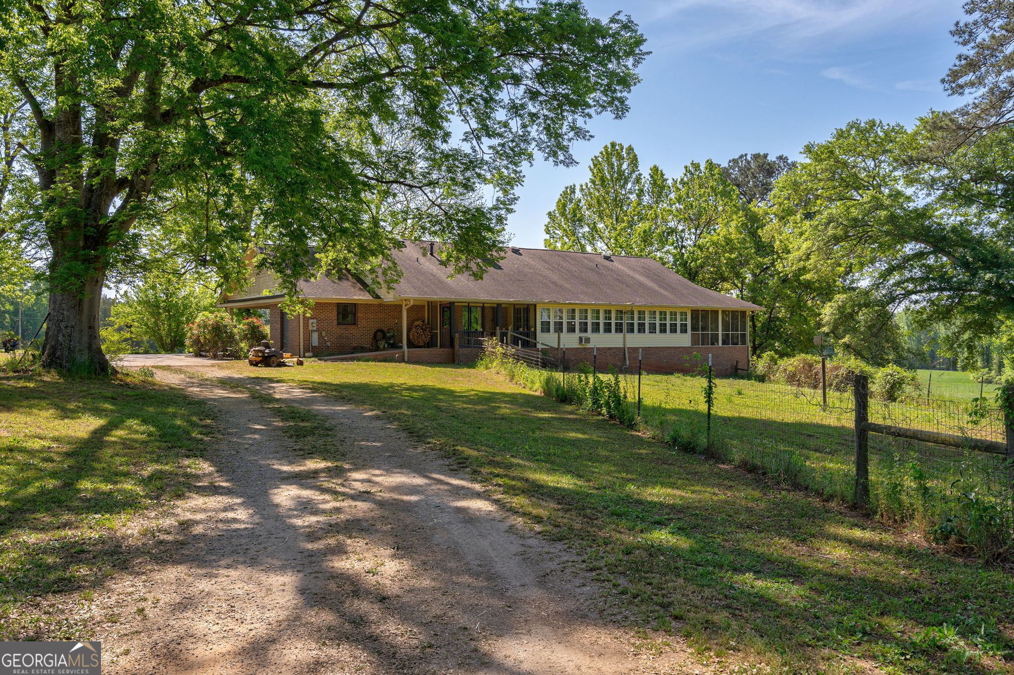 1281 Apalachee River Road Madison, GA 30650 - Photo 67 of 98 a view of a house with a yard