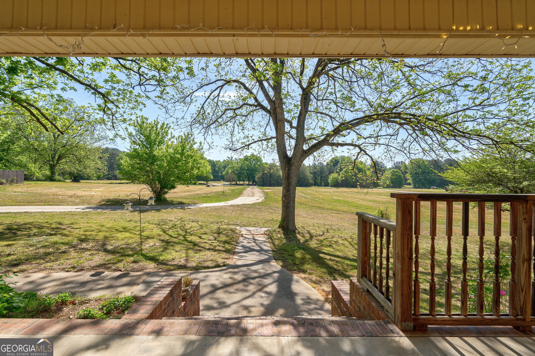 1281 Apalachee River Road Madison, GA 30650 - Photo 70 of 98 a view of a pathway with a yard