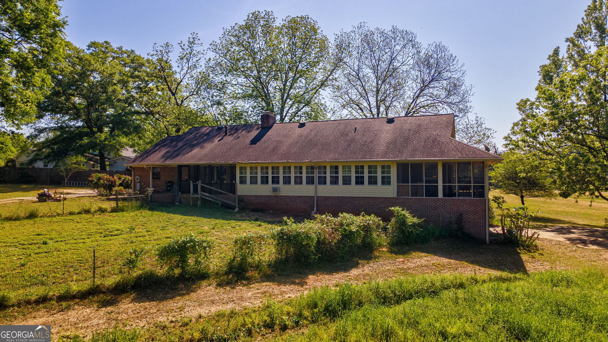 1281 Apalachee River Road Madison, GA 30650 - Photo 77 of 98 a view of a house with a yard