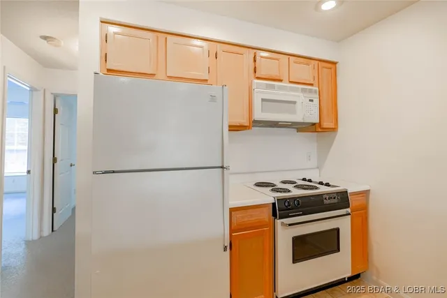 $250,000 | 188 Charleston Drive, Unit 2A, Four Seasons, MO 65049