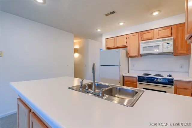 $250,000 | 188 Charleston Drive, Unit 2A, Four Seasons, MO 65049