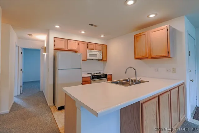 $250,000 | 188 Charleston Drive, Unit 2A, Four Seasons, MO 65049