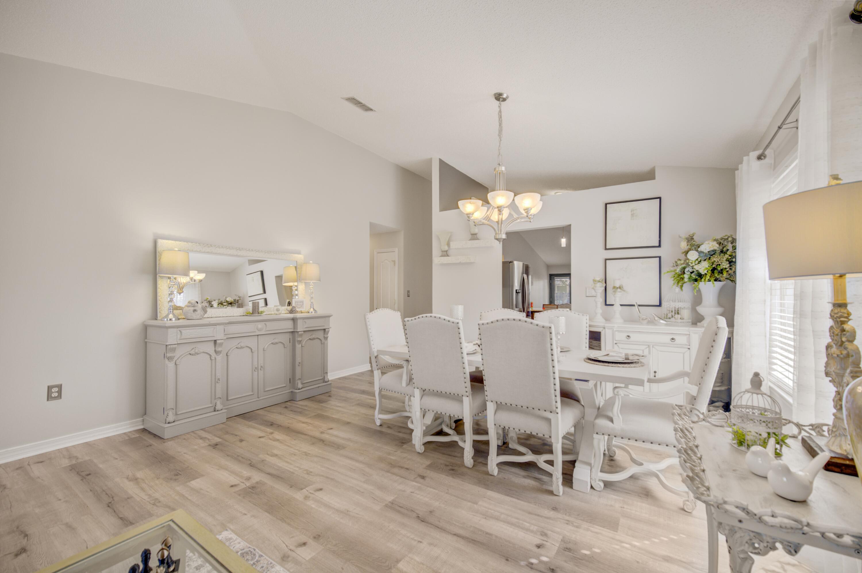 35 Red Bay Court Santa Rosa Beach, FL 32459 - Photo 20 of 73 a dining room with furniture and window