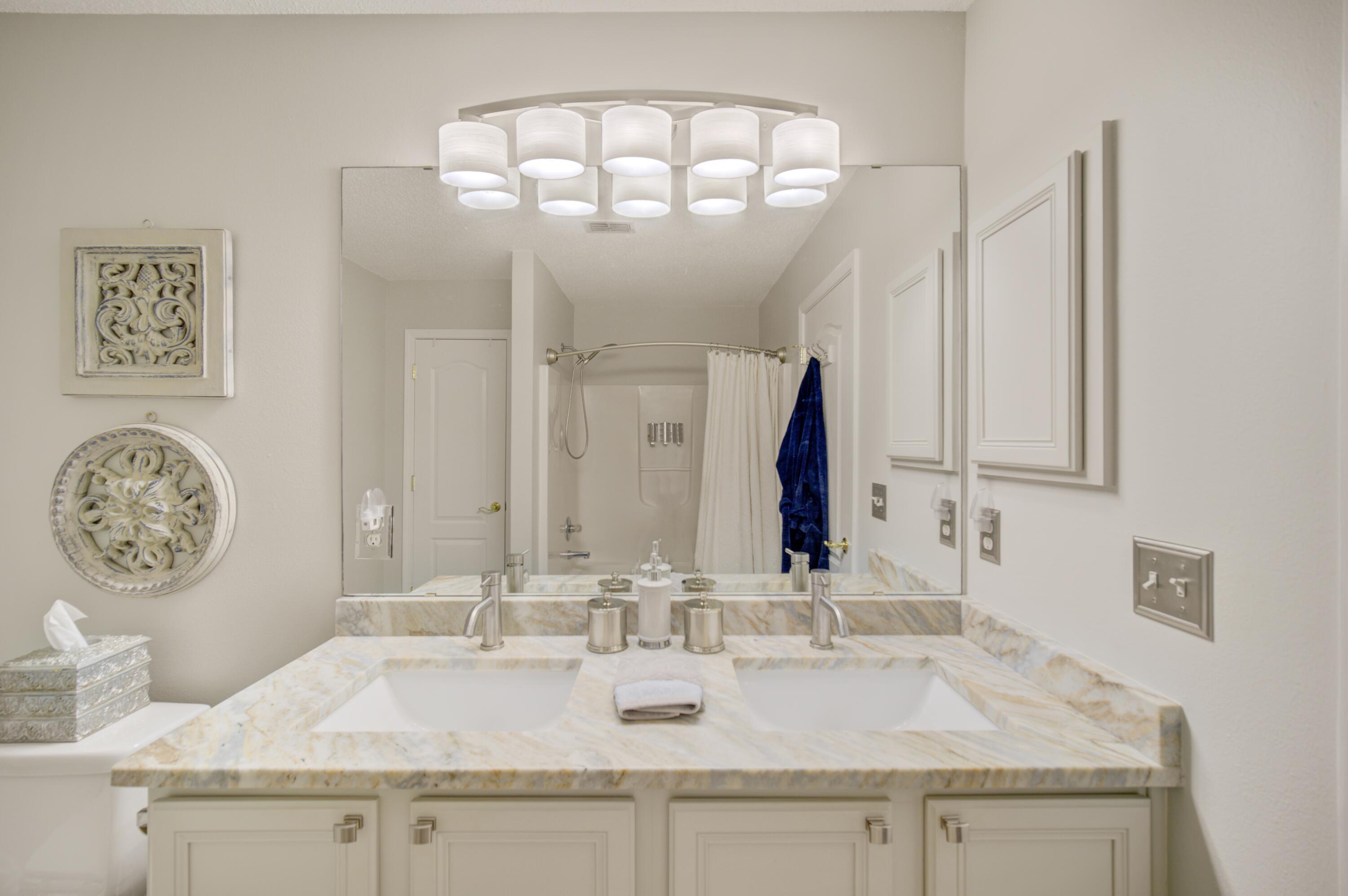 35 Red Bay Court Santa Rosa Beach, FL 32459 - Photo 42 of 73 a bathroom with a sink and a mirror