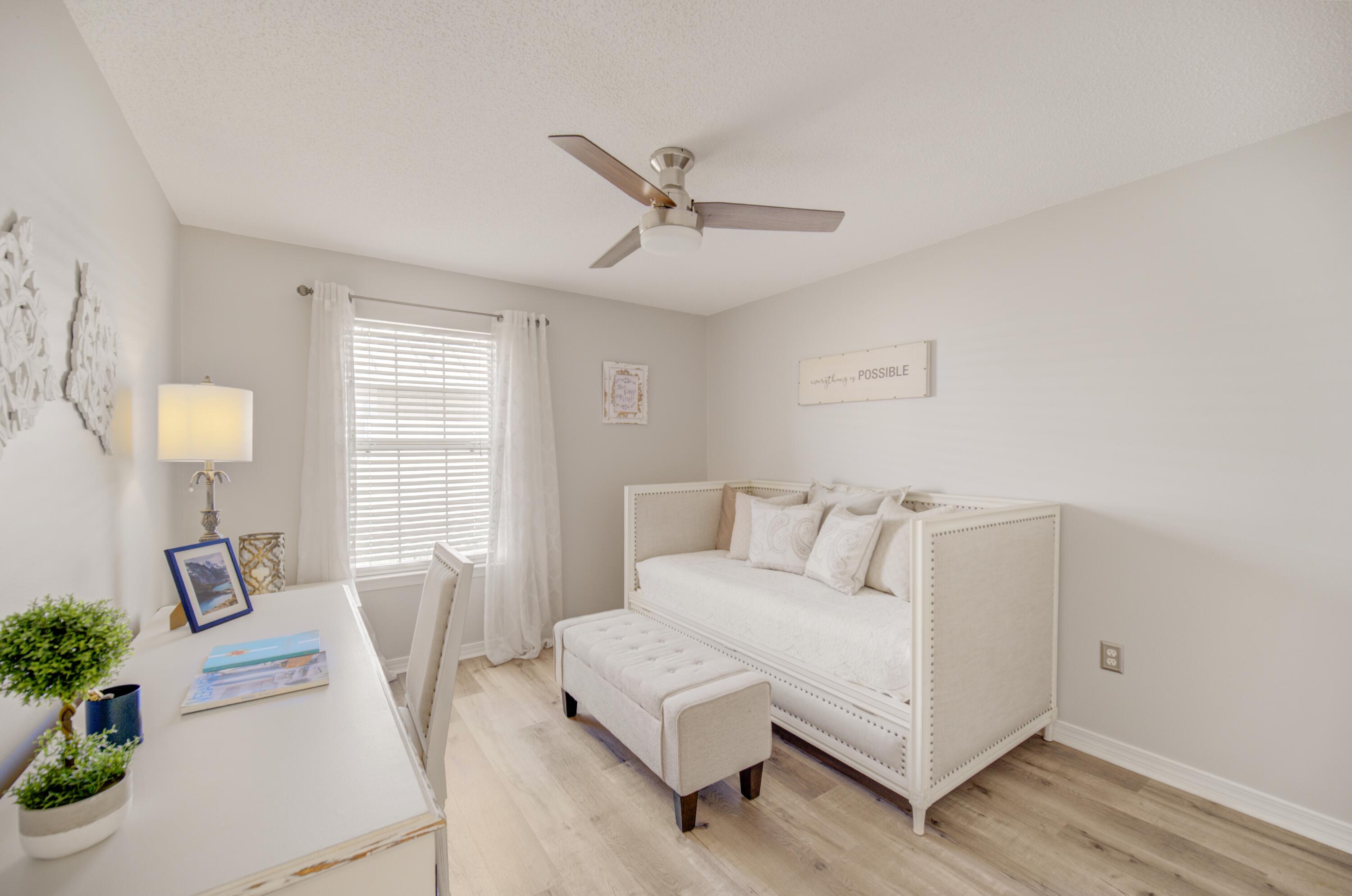 35 Red Bay Court Santa Rosa Beach, FL 32459 - Photo 46 of 73 a bedroom with a large bed and potted plant on the dresser