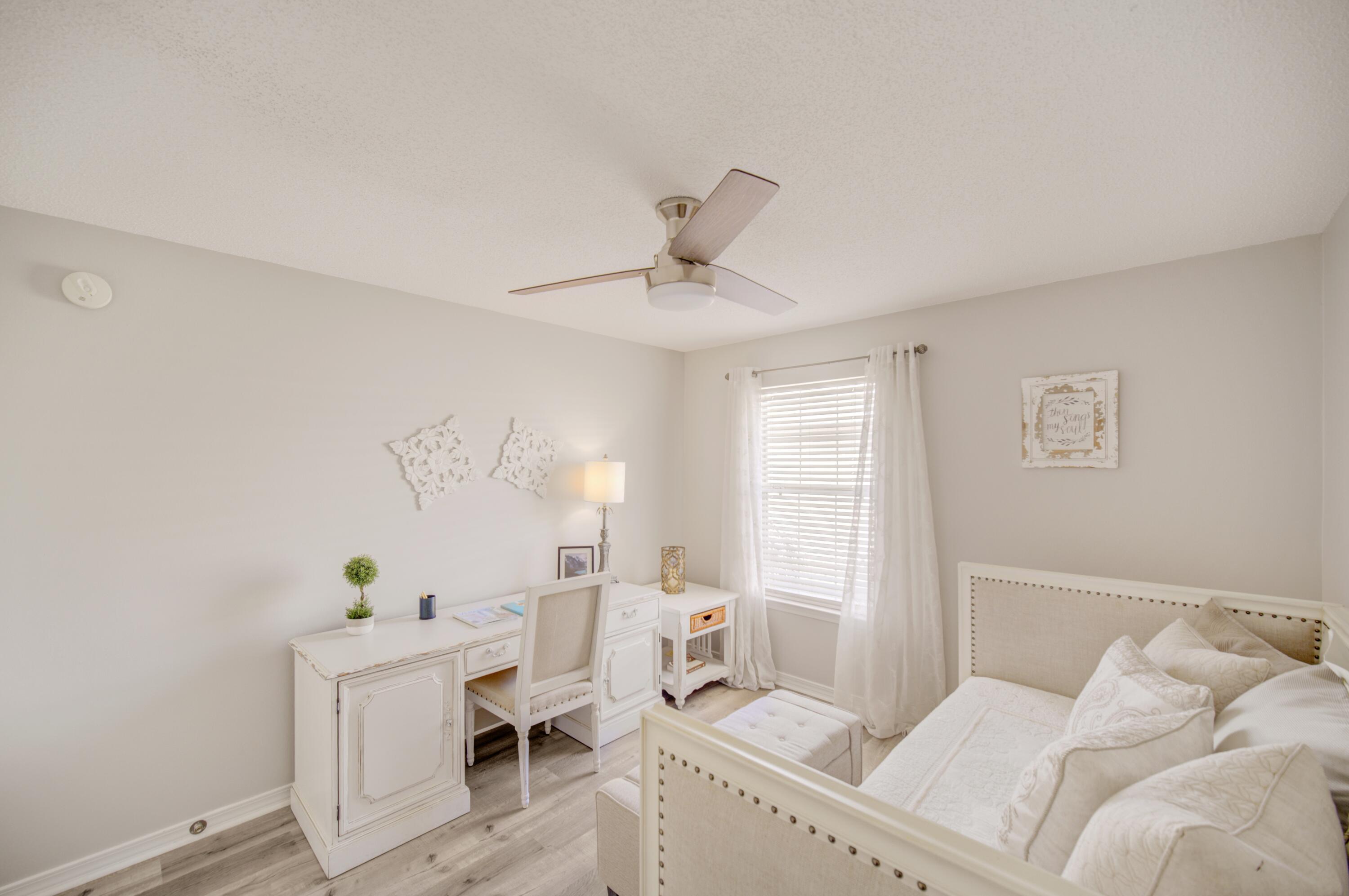 35 Red Bay Court Santa Rosa Beach, FL 32459 - Photo 47 of 73 a bedroom with a bed and a window