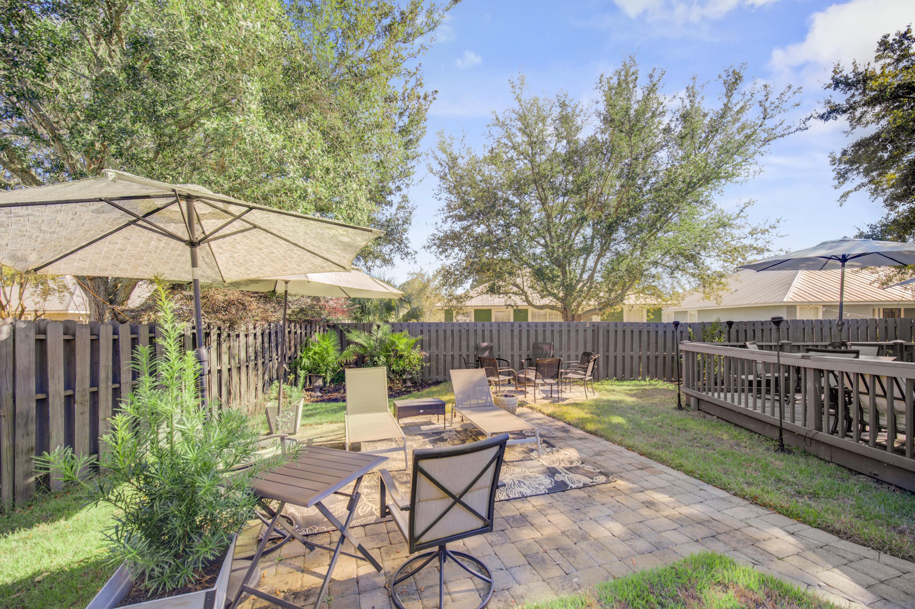 35 Red Bay Court Santa Rosa Beach, FL 32459 - Photo 58 of 73 a view of a chair and table in backyard