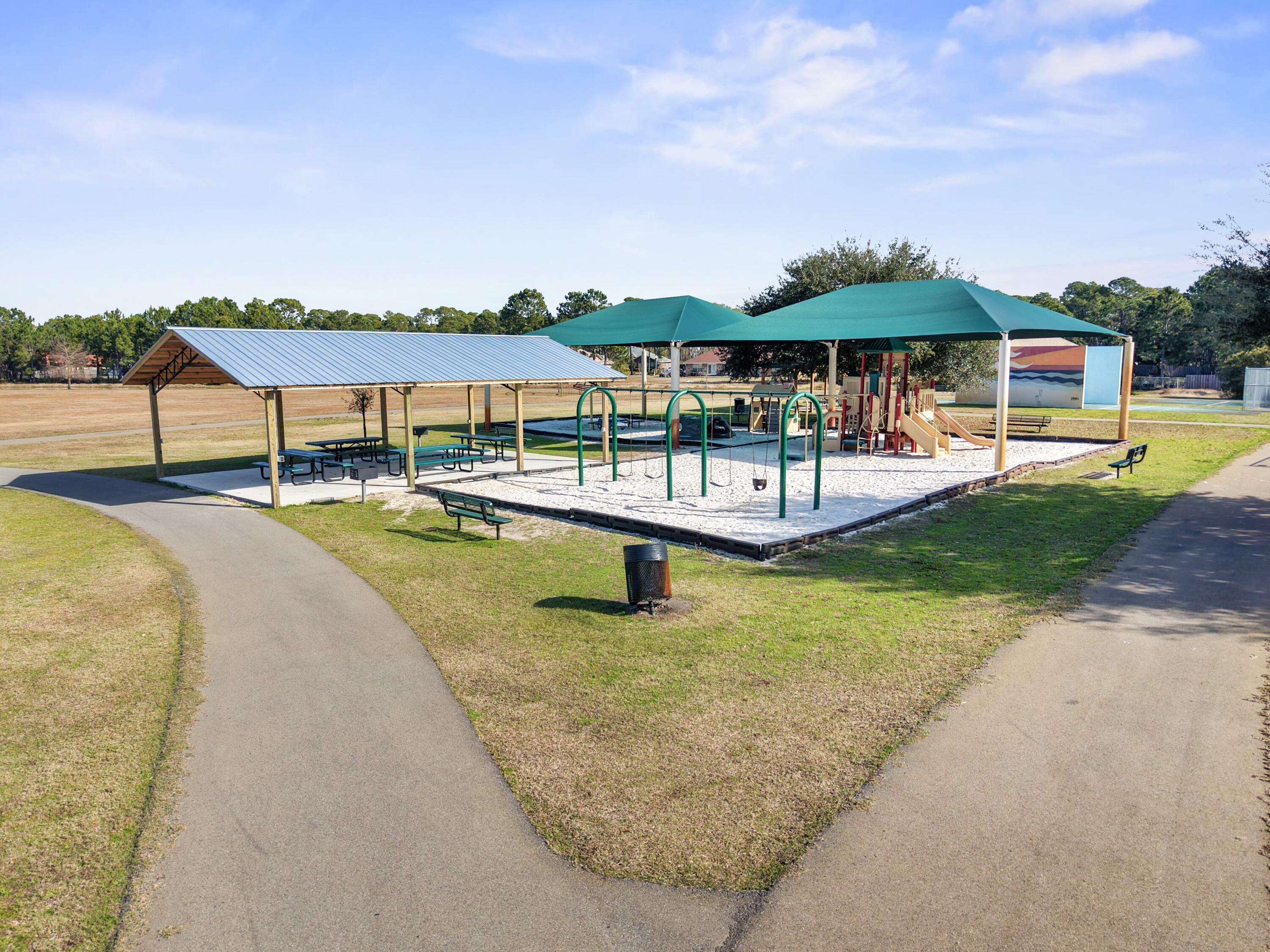 35 Red Bay Court Santa Rosa Beach, FL 32459 - Photo 67 of 73 a swimming pool with outdoor seating and yard