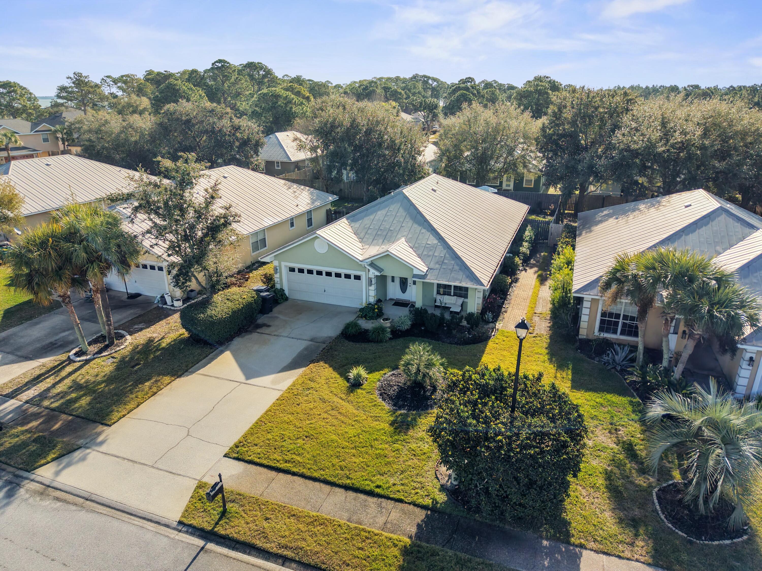 35 Red Bay Court Santa Rosa Beach, FL 32459 - Photo 8 of 73 an aerial view of a house with a garden
