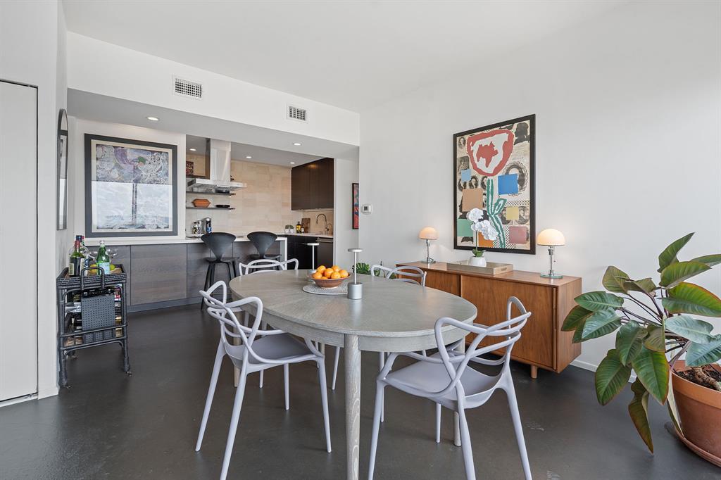 1801 Lavaca Street, Unit 12K Austin, TX 78701 - Photo 6 of 27 Dining room featuring finished concrete floors and recessed lighting