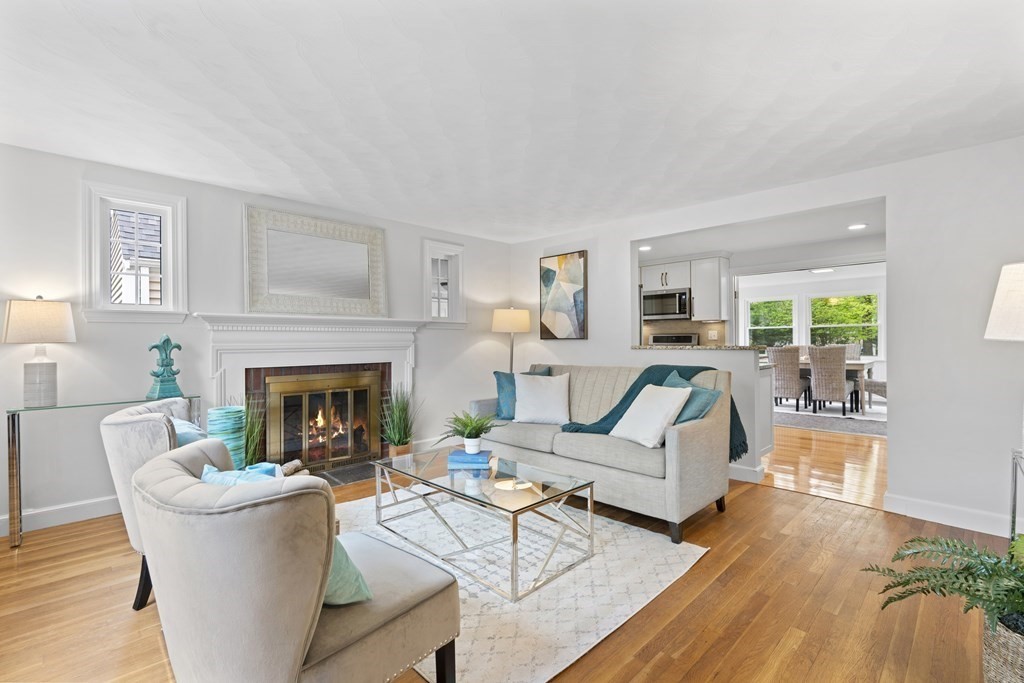 9 Ferndale Road Natick, MA 01760 - Photo 3 of 24 a living room with furniture and a fireplace