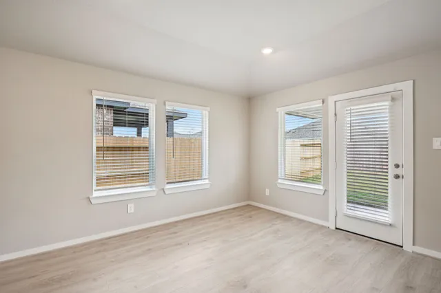 an empty room with windows