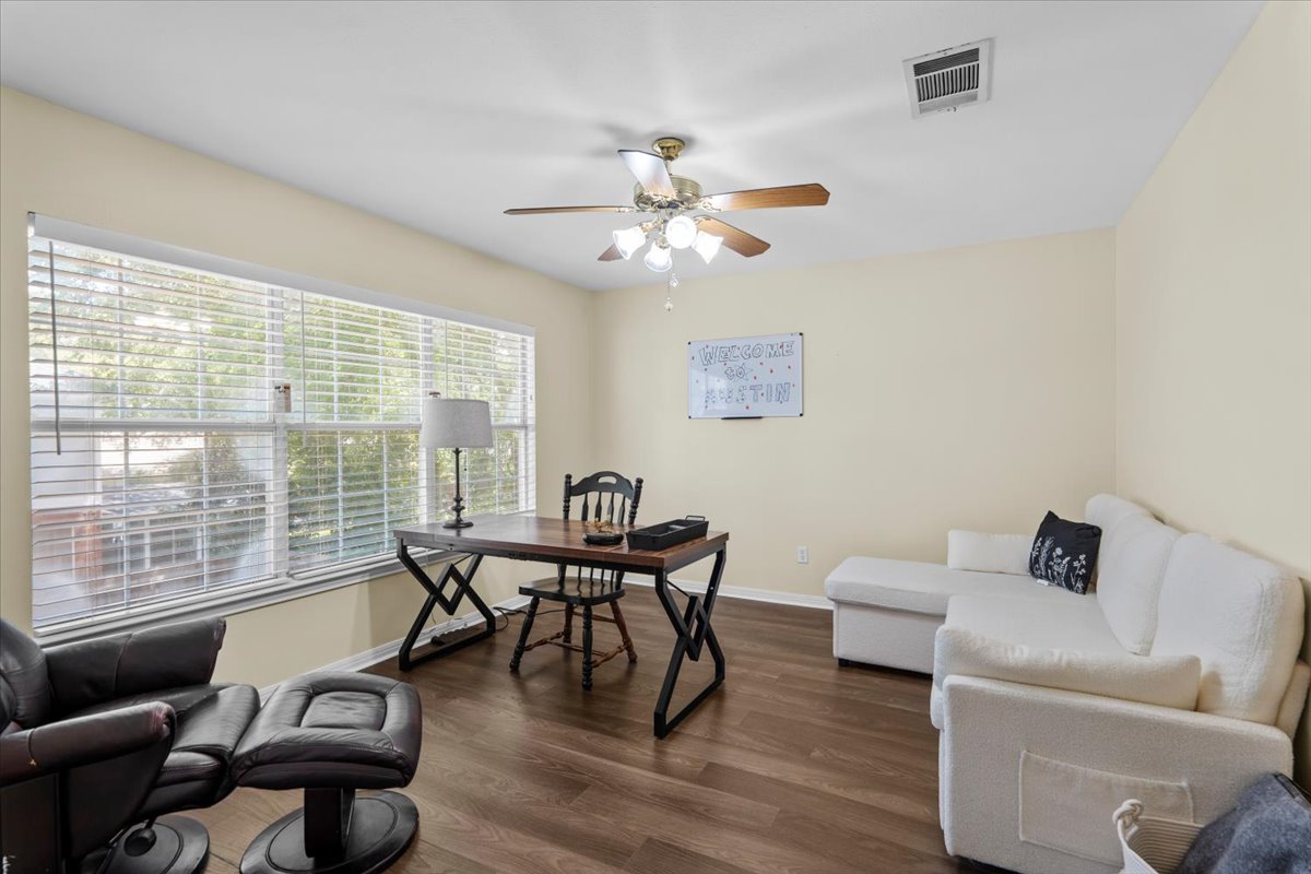 10116 Pinehurst Drive Austin, TX 78747 - Photo 17 of 37 Office featuring dark wood finished floors and ceiling fan