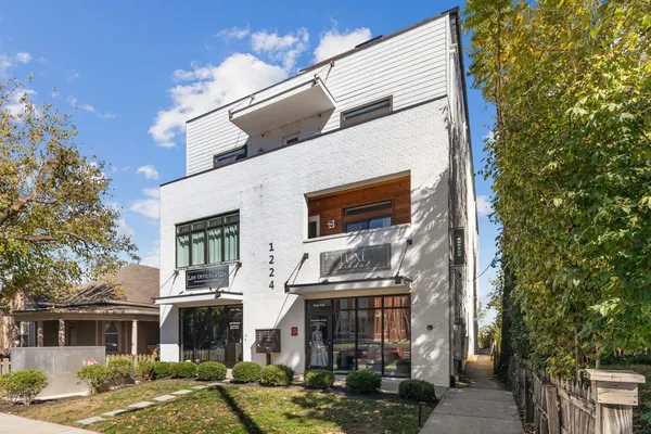 a front view of a building with street view
