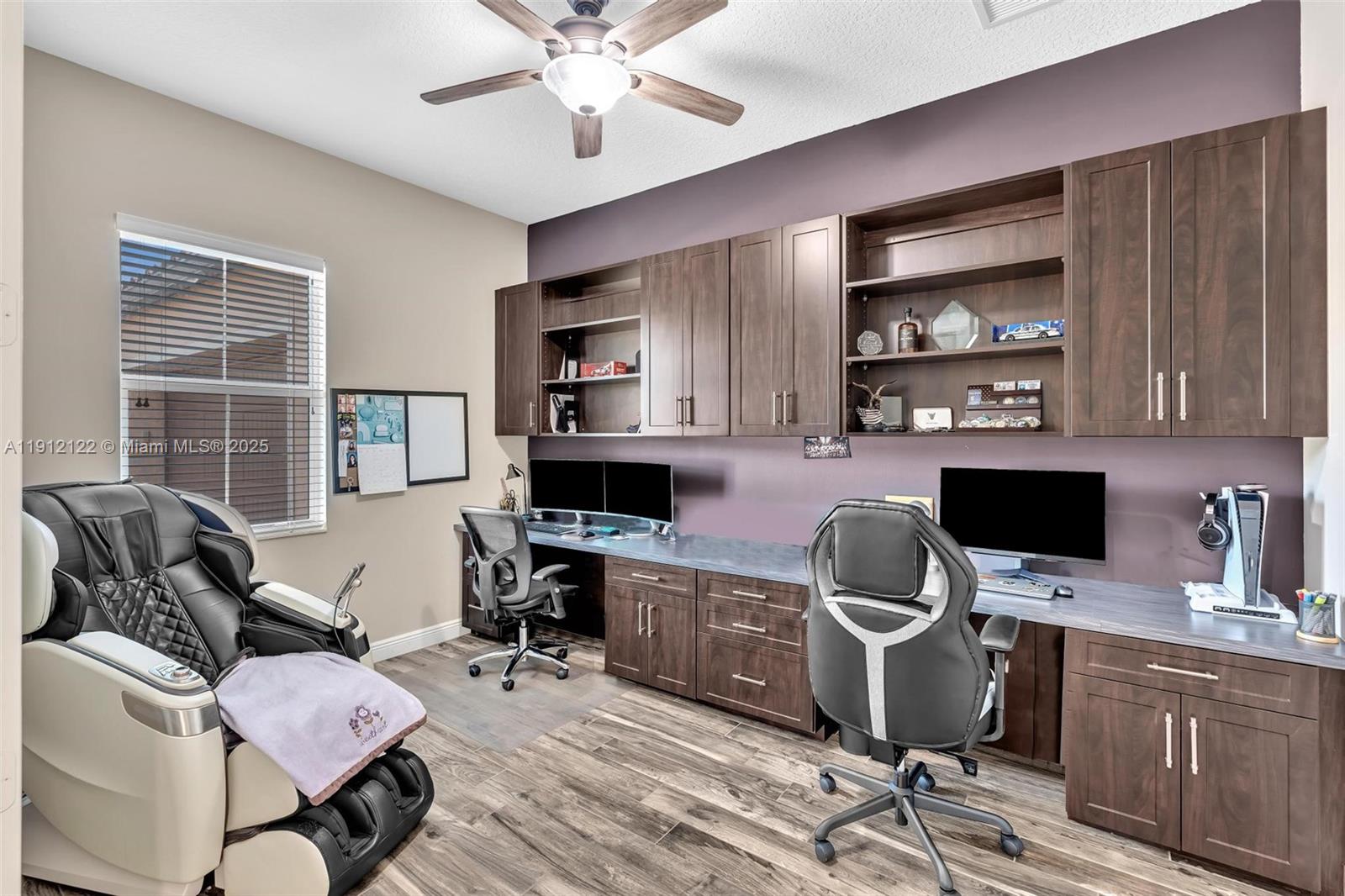 13220 Southwest 13th Street Davie, FL 33325 - Photo 2 of 65 a view of a workspace with furniture and a window