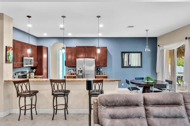 a lobby with furniture and floor to ceiling window