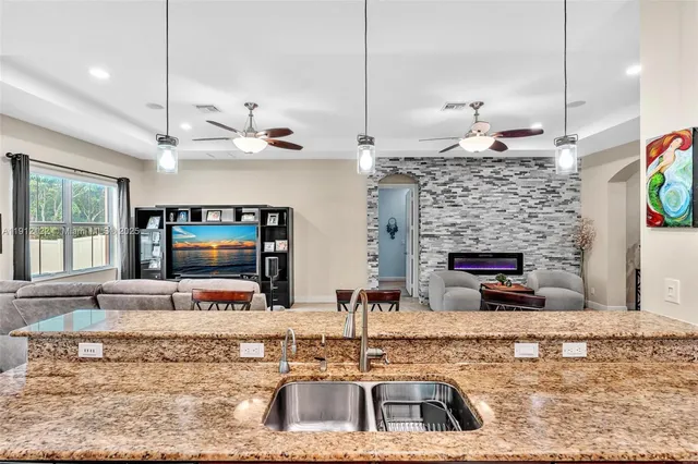 a patio with a yard table and chairs