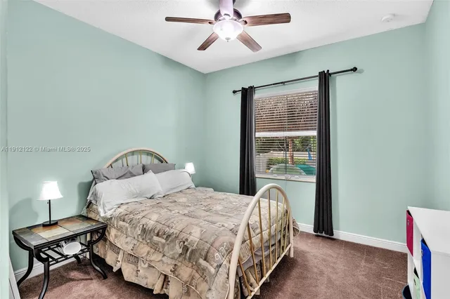 a utility room with sink dryer and washer