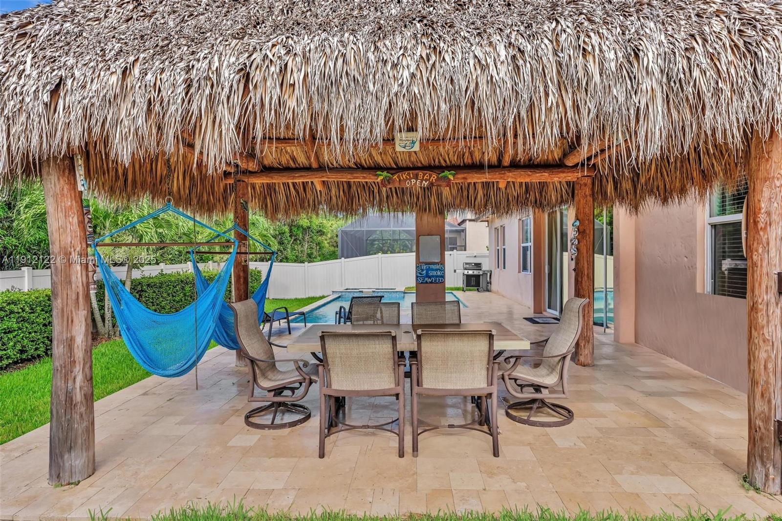 13220 Southwest 13th Street Davie, FL 33325 - Photo 54 of 65 a view of outdoor space with chairs