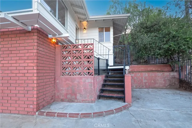 a view of front door and wooden floor