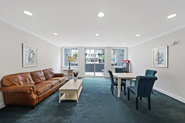 a room with gym equipment and a large window