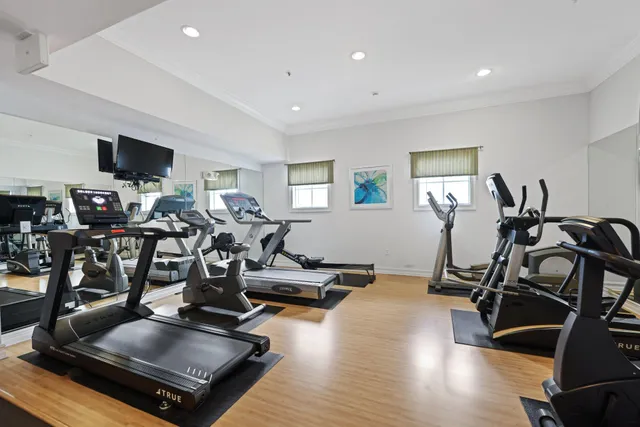 a view of living room with furniture and fireplace