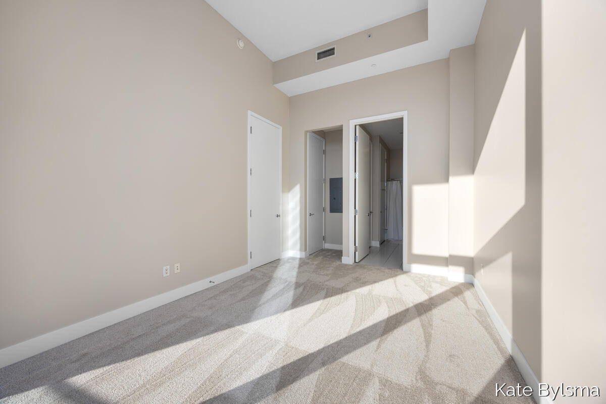 335 Bridge Street Northwest, Unit 602 Grand Rapids, MI 49504 - Photo 24 of 35 Primary Bedroom