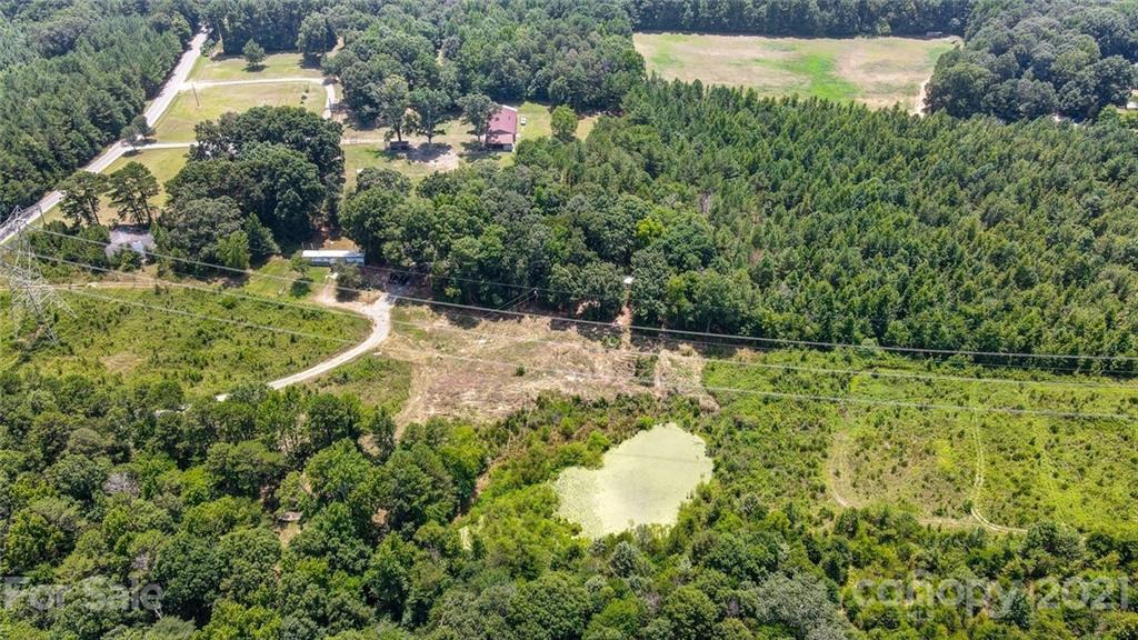 3904 Richardson Road Monroe, NC 28112 - Photo 1 of 12 a view of a back yard of the house