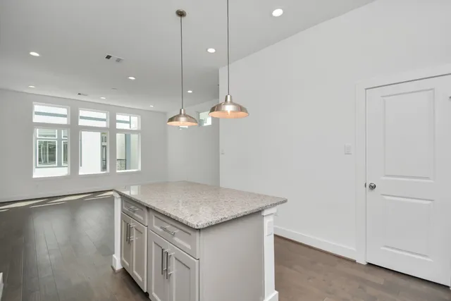 a view of a kitchen and living room