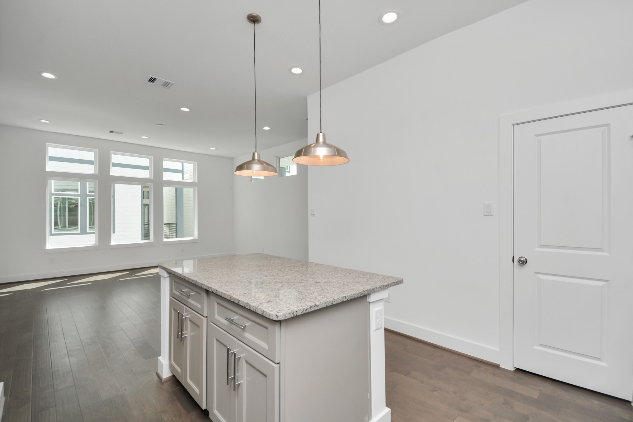 420 Janisch Road, Unit B Houston, TX 77018 - Photo 13 of 24 a view of a kitchen and living room