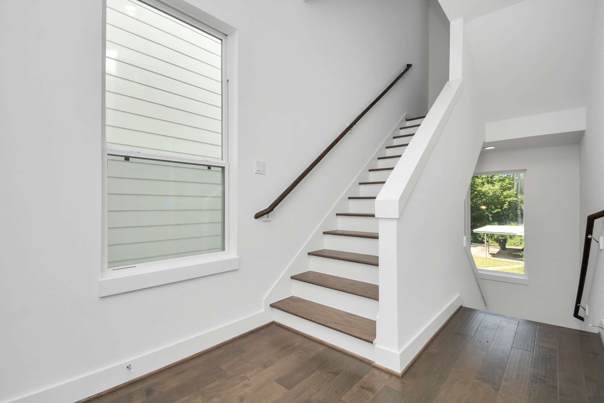 420 Janisch Road, Unit B Houston, TX 77018 - Photo 16 of 24 a view of entryway and hall with wooden floor