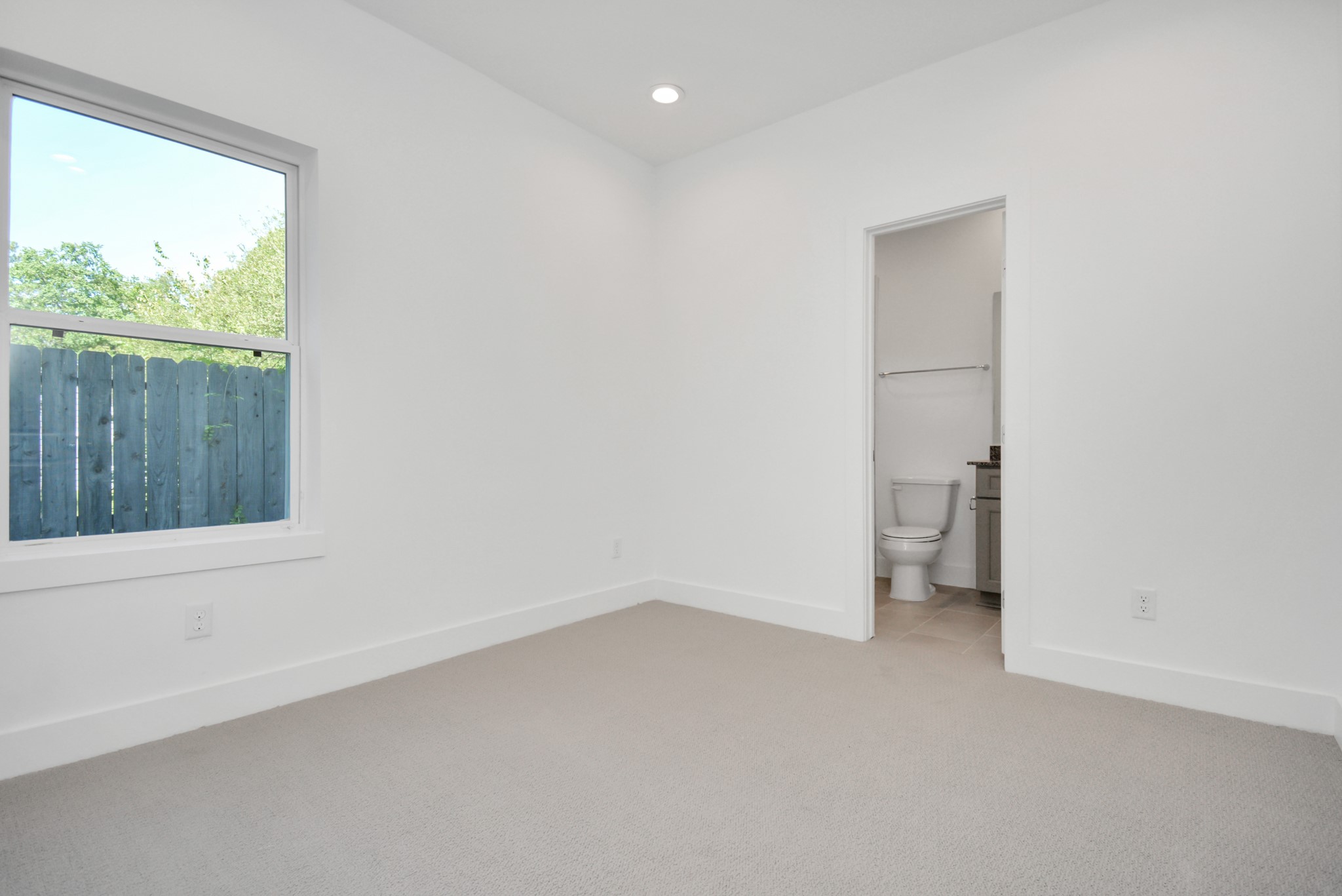 420 Janisch Road, Unit B Houston, TX 77018 - Photo 3 of 24 a view of a room with a closet and a window