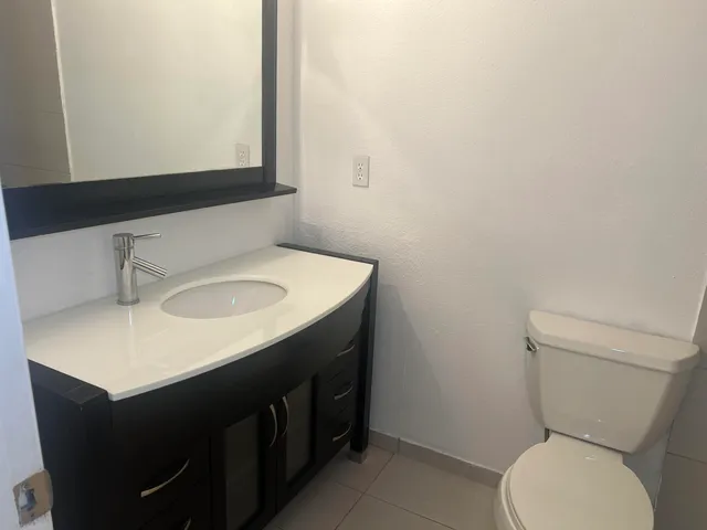 a view of a table and chairs in a room