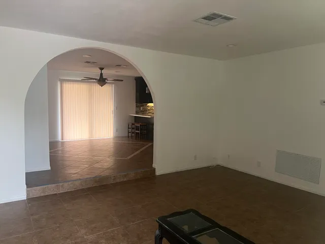 a dining table chairs and a coffee table