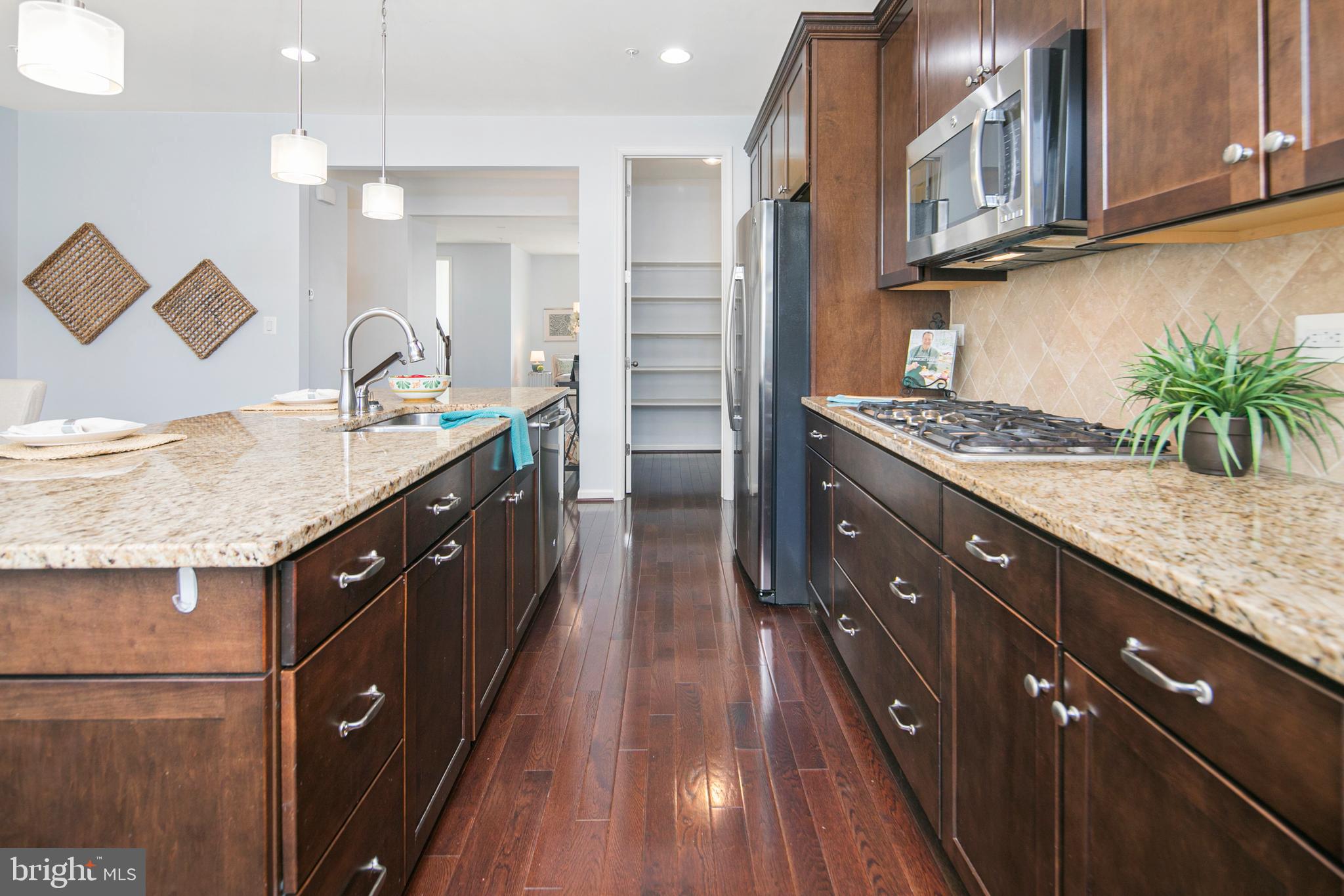 717 Holden Road Frederick, MD 21701 - Photo 7 of 40 Large island and gas cooktop