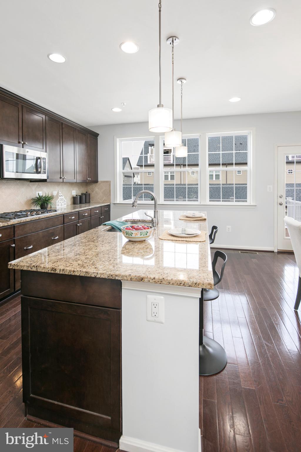 717 Holden Road Frederick, MD 21701 - Photo 9 of 40 Entertain around kitchen island