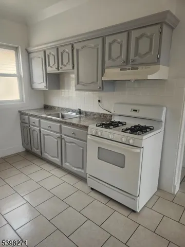 a bathroom with a bathtub sink and toilet