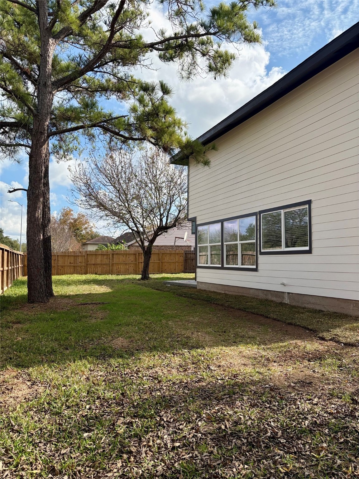 12303 Split Rail Lane Houston, TX 77071 - Photo 12 of 50 The first-floor windows have been fully replaced to enhance energy efficiency and bring abundant natural light into the home.