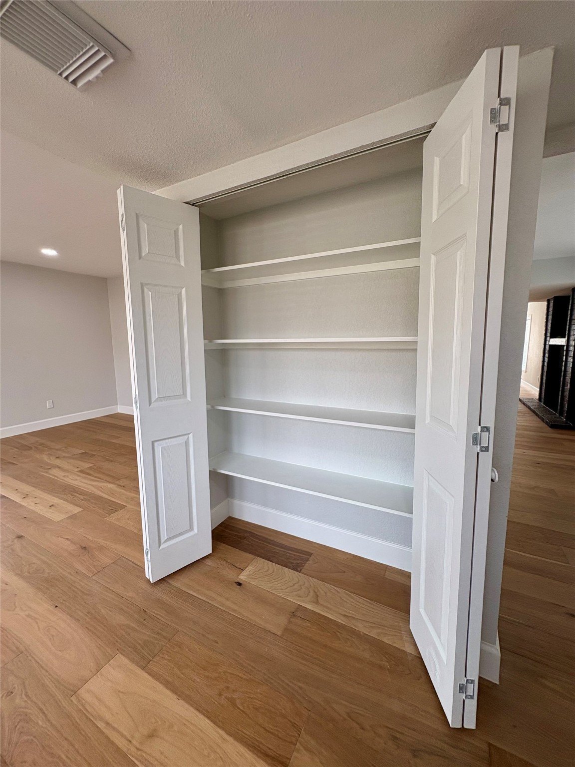 12303 Split Rail Lane Houston, TX 77071 - Photo 33 of 50 A spacious pantry adds excellent storage options, perfectly blending functionality and design in this beautifully updated kitchen.