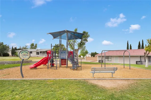 a view of a street with a building in the background