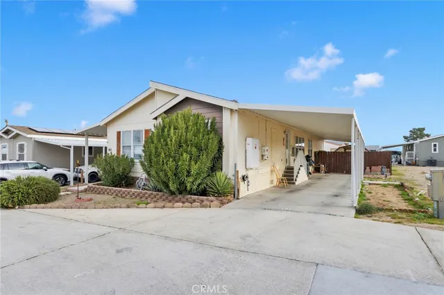 a view of a house with entertaining space