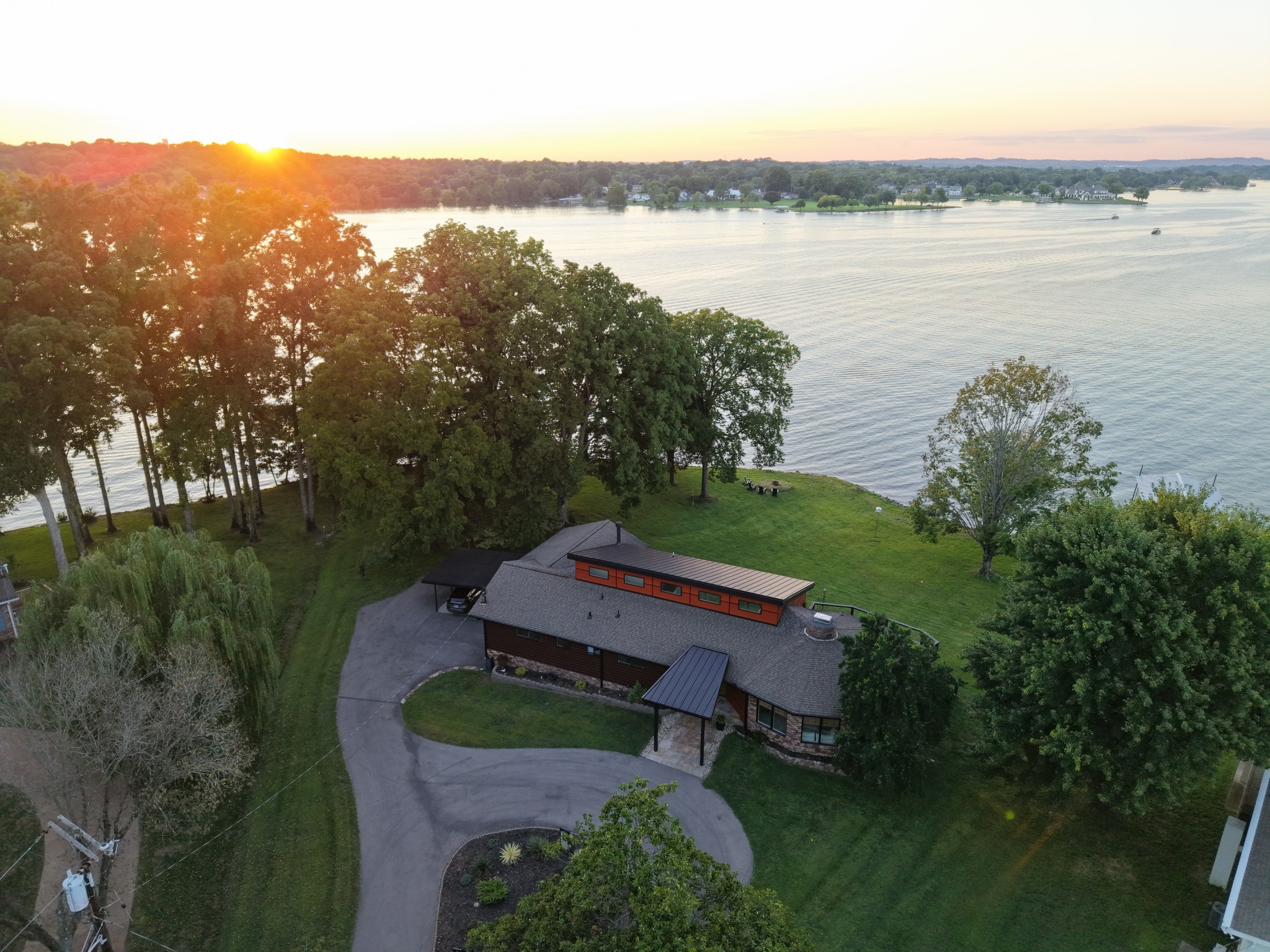 an aerial view of a house with garden space and outdoor seating