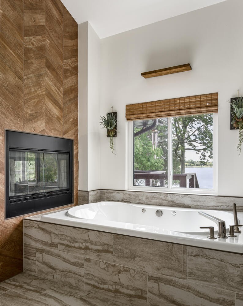 104 Windward Point Hendersonville, TN 37075 - Photo 27 of 49 a living room with a large window and a fireplace