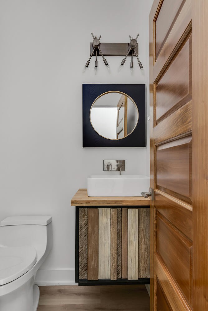 104 Windward Point Hendersonville, TN 37075 - Photo 31 of 49 a bathroom with a toilet sink and mirror