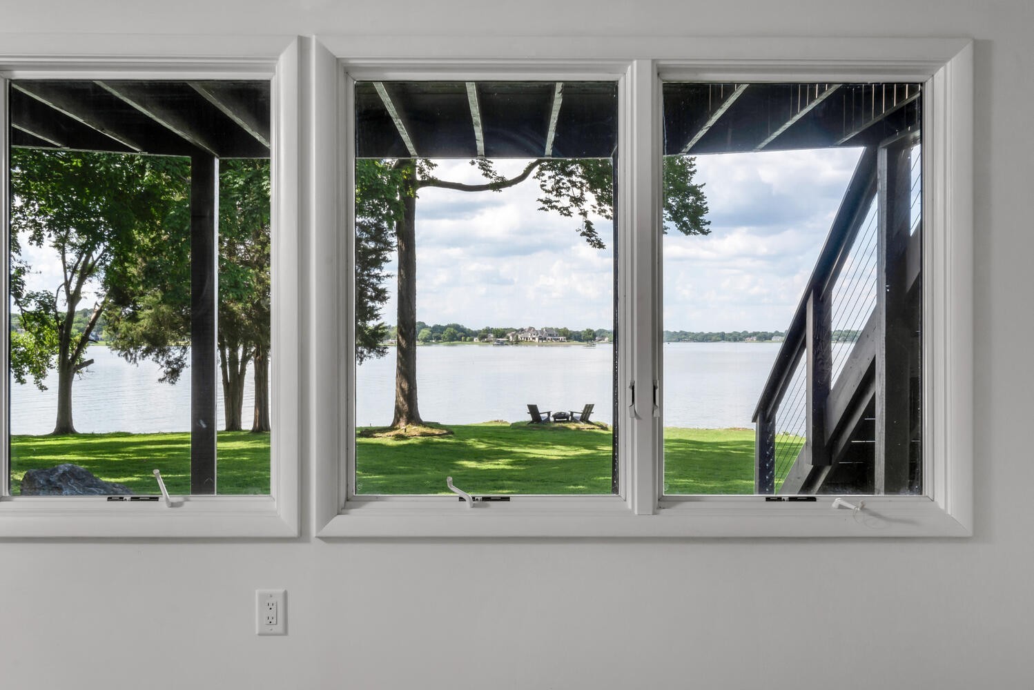 104 Windward Point Hendersonville, TN 37075 - Photo 41 of 49 a view of a house with a floor to ceiling window and wooden floor