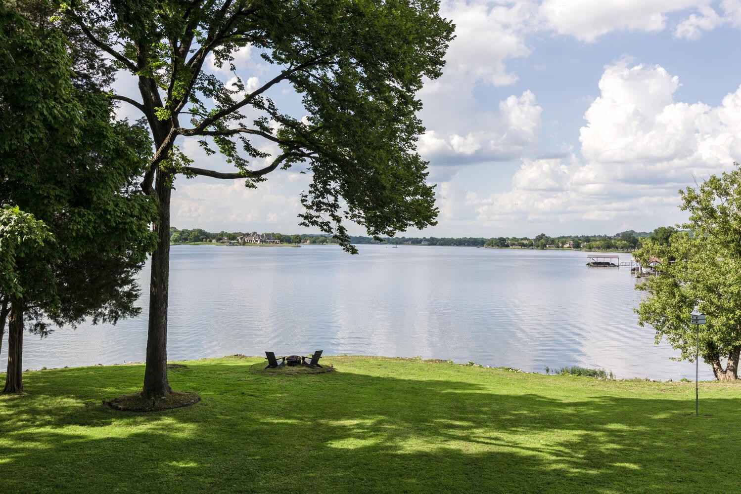 104 Windward Point Hendersonville, TN 37075 - Photo 42 of 49 a view of a lake from a yard